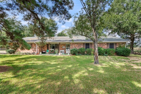 Photo of 204 Gerald Street, Willis, TX 77378 (MLS # 20919601)