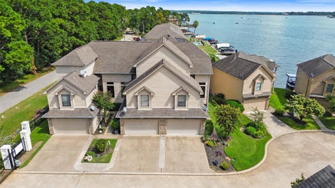 Photo of 350 Old Aqua Landing E, Conroe, TX 77356 (MLS # 90354687)