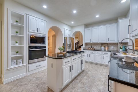 Photo of 911 Chisel Point Drive, Houston, TX 77094 (MLS # 36988040) Photo of 911 Chisel Point Drive, Houston, TX 77094 (MLS # 36988040)