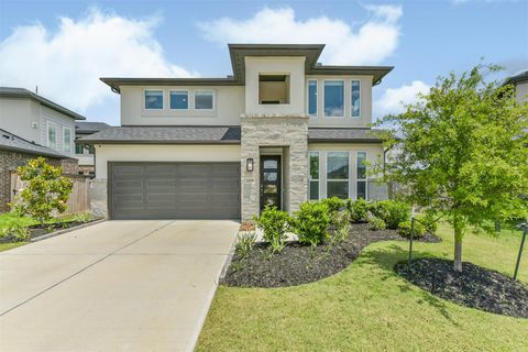Photo of 21606 Laggan Cliff Lane, Cypress, TX 77433 (MLS # 30336926)