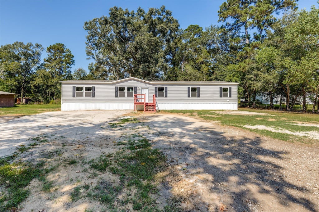 Photo of 20006 Red Oaks South, New Caney, TX 77357 (MLS # 20767425)