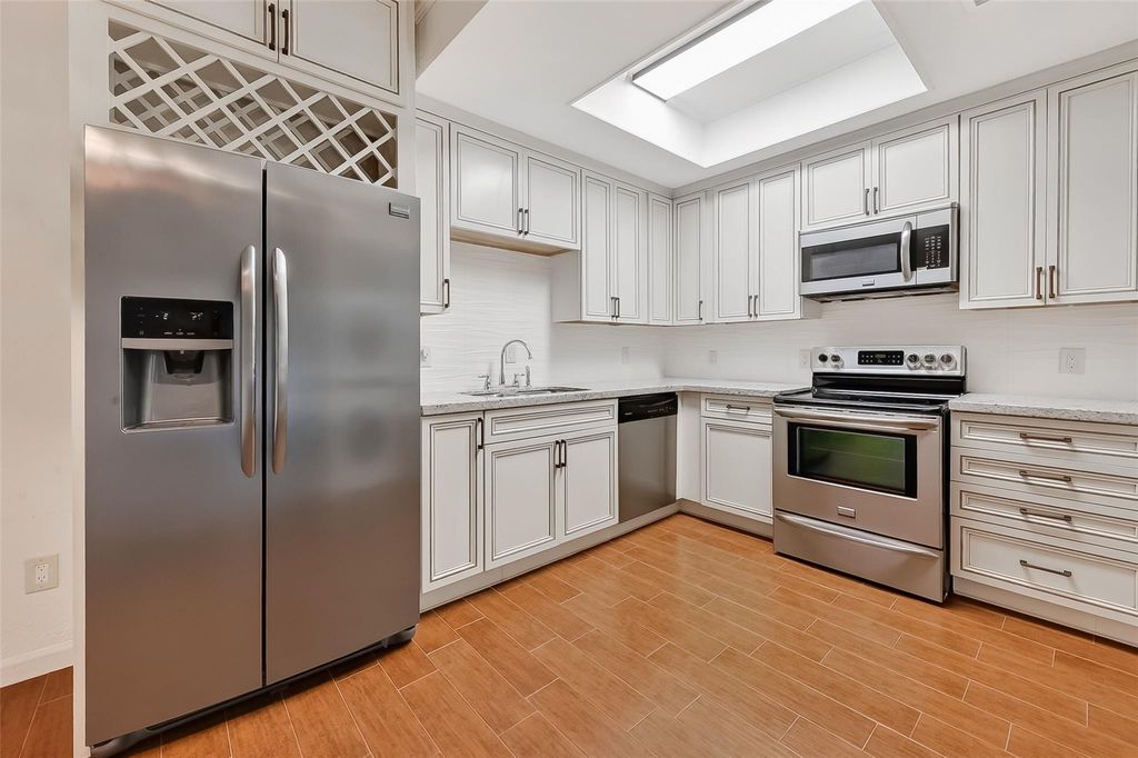 Photo of 11711 Memorial Drive #305, Houston, TX 77024 (MLS # 91260339)