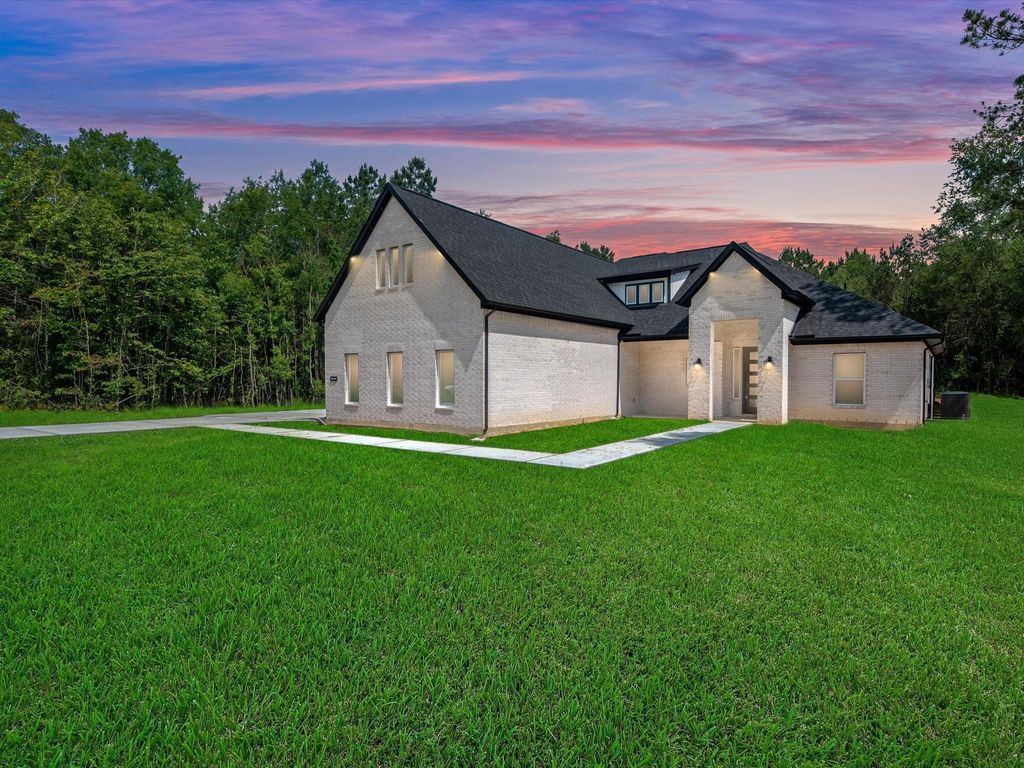 Photo of 1859 Pin Oak Drive, Dayton, TX 77535 (MLS # 92840861)