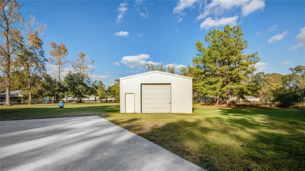 Photo of 26961 Lantern Lane, New Caney, TX 77357 (MLS # 89155964)