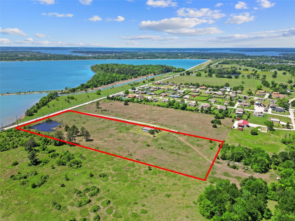 Photo of 11242 Longstreet Road, Willis, TX 77318 (MLS # 68008462)
