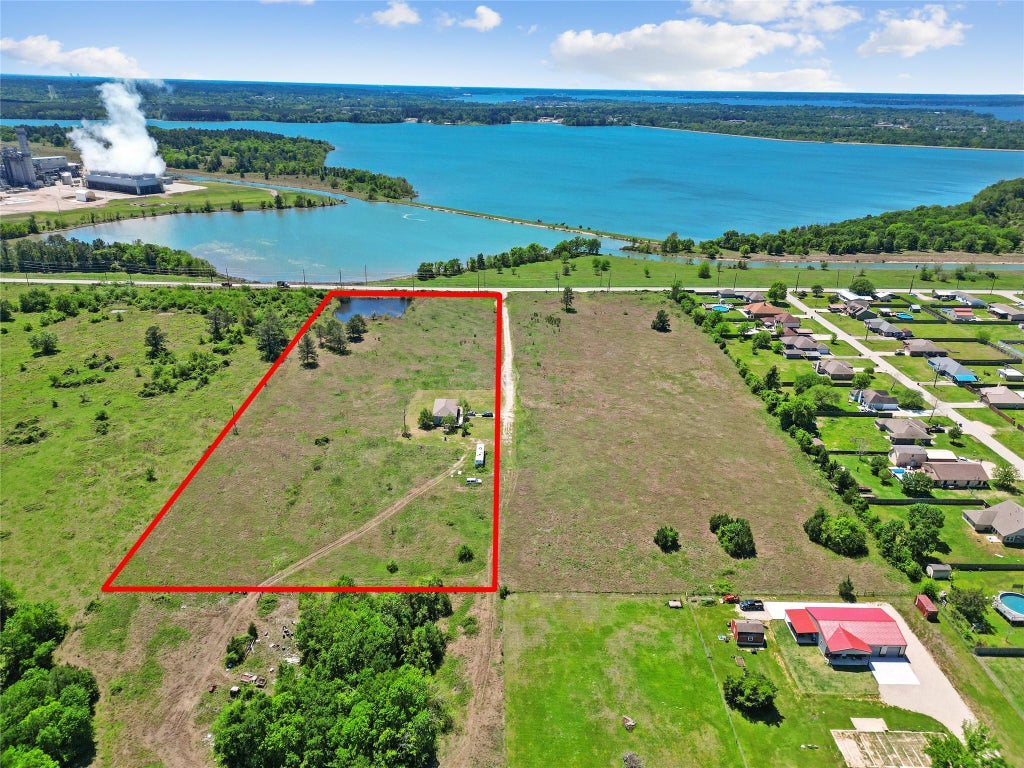 Photo of 11242 Longstreet Road, Willis, TX 77318 (MLS # 68008462)