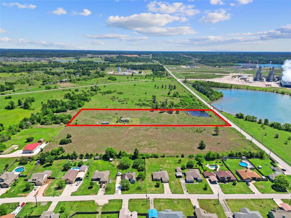 Photo of 11242 Longstreet Road, Willis, TX 77318 (MLS # 68008462)