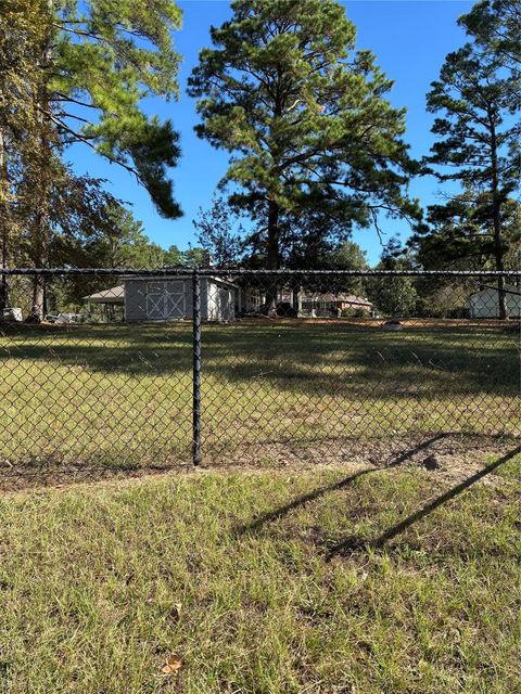Photo of TBD Bridgelanding---Lot 56, Onalaska, TX 77360 (MLS # 49191329)