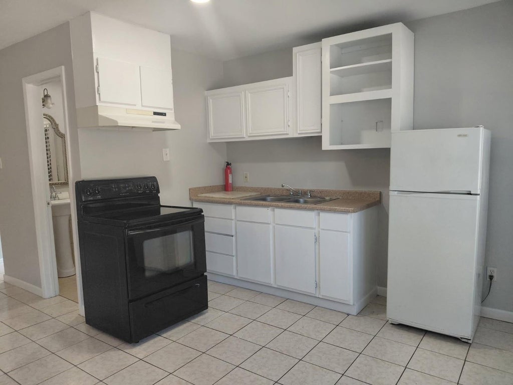 Photo of 1303 Saddle Rock Drive, Houston, TX 77088 (MLS # 77777540)