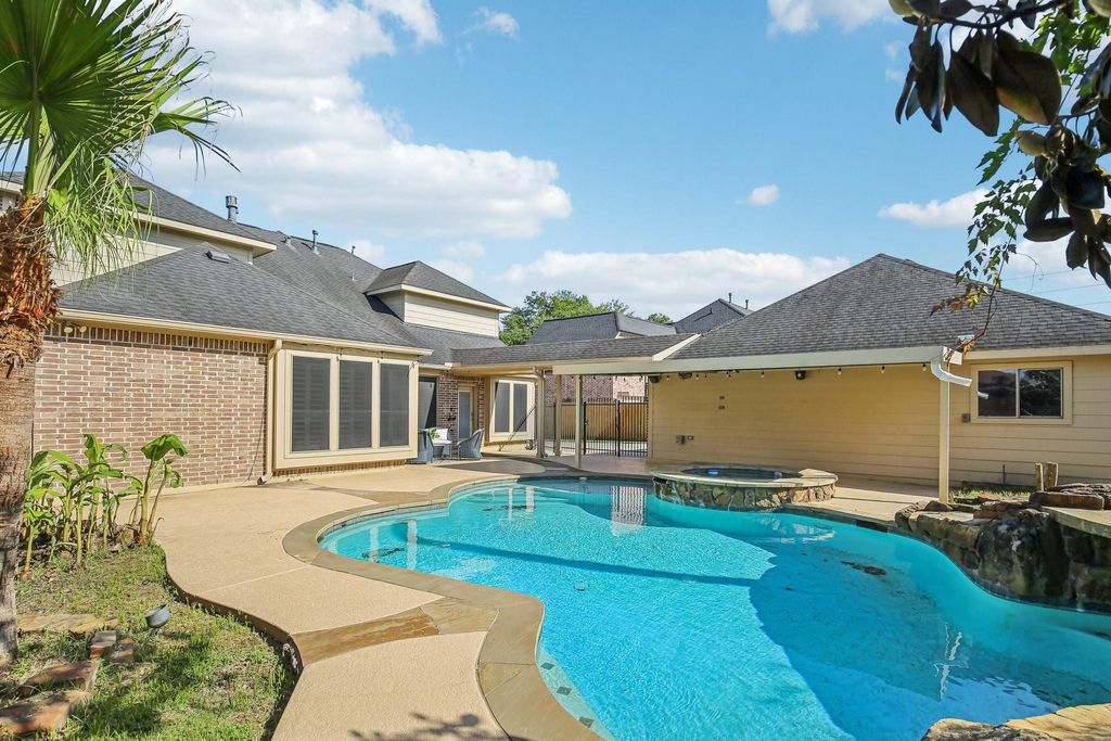 Photo of 15614 Stone Gables Lane, Houston, TX 77044 (MLS # 3811423)