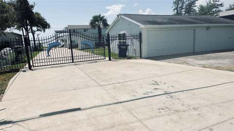 Photo of 8720 Ocean Drive, Beach City, TX 77523 (MLS # 54820459)