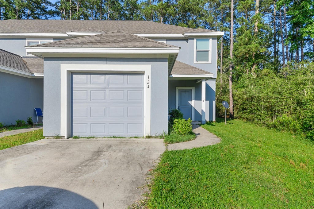 Photo of 124 Artesian Way, New Caney, TX 77357 (MLS # 32987982)