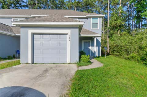 Photo of 124 Artesian Way, New Caney, TX 77357 (MLS # 32987982)