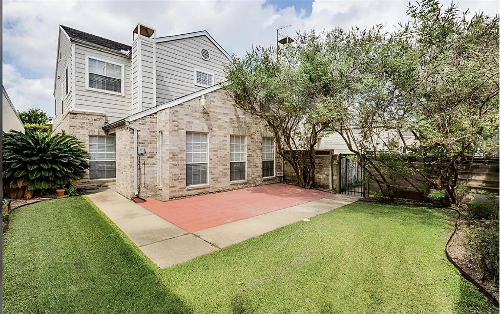 Photo of 12565 Piping Rock Drive, Houston, TX 77077 (MLS # 9250696)