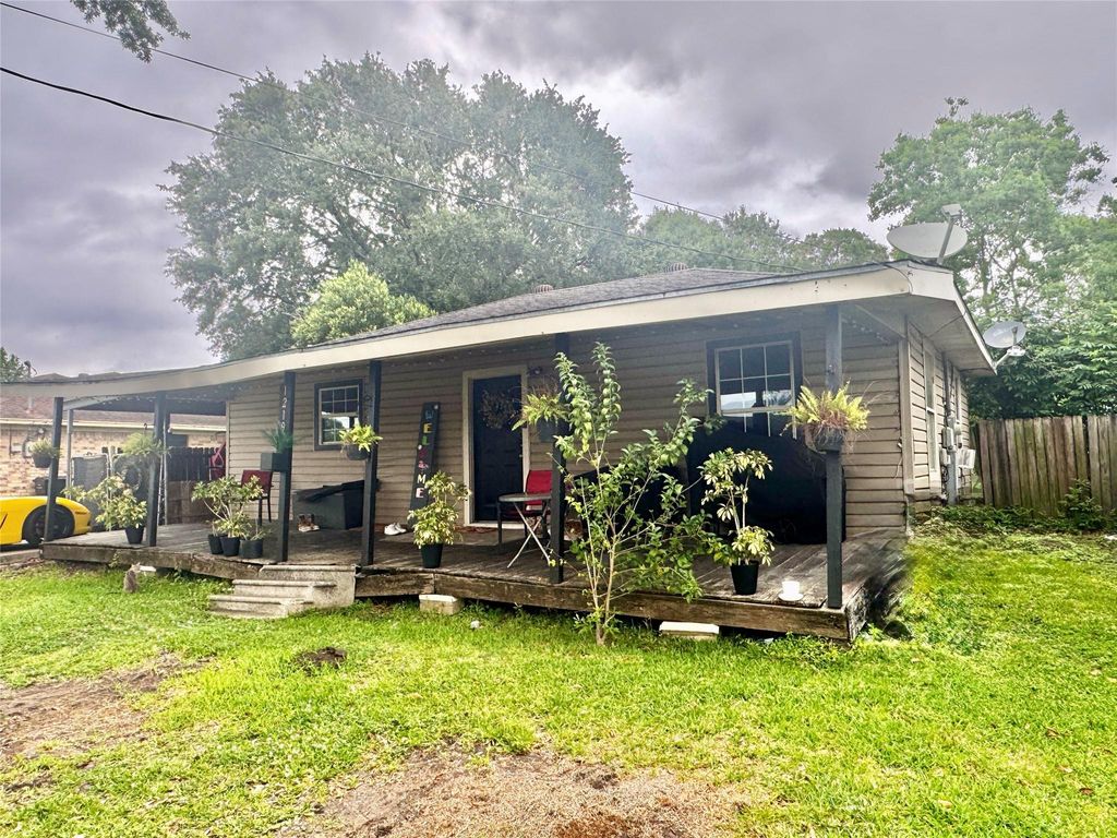 Photo of 1219 S 13th Street, Nederland, TX 77627 (MLS # 96928902)
