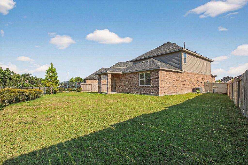 Photo of 9205 Inland Leather Lane, Conroe, TX 77385 (MLS # 68106990)