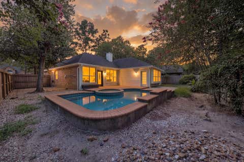 Photo of 54 Wrens Song Place, The Woodlands, TX 77382 (MLS # 49467901)
