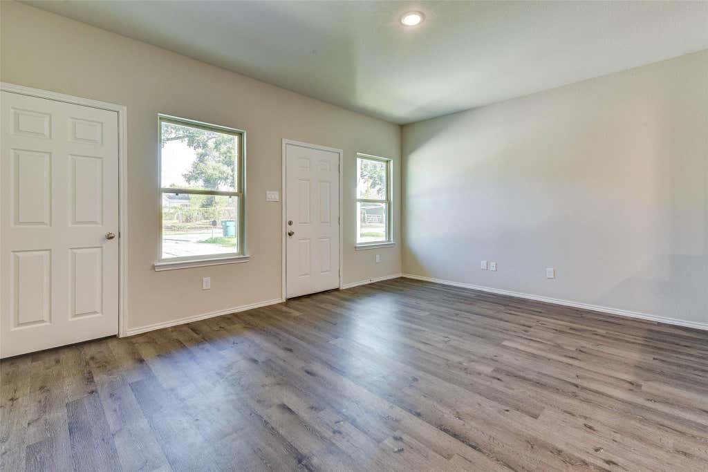 Photo of 407 E Avenue G, Conroe, TX 77301 (MLS # 69066934)
