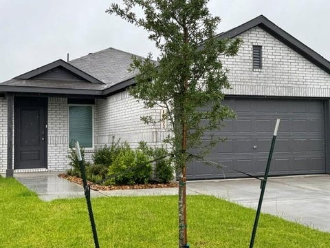 Photo of 18072 Trepito Avenue, New Caney, TX 77357 (MLS # 97517929)