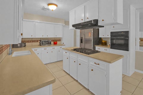 Photo of 4205 Lariat Drive, Baytown, TX 77521 (MLS # 2109292)