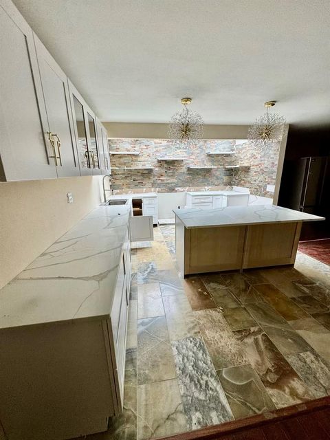 Photo of 14127 Sandfield Drive, Houston, TX 77077 (MLS # 28868660)