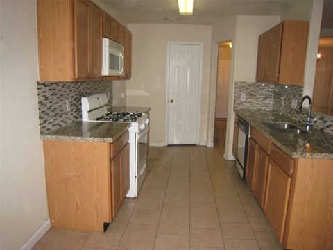 Photo of 7822 Winding Creek View View, Houston, TX 77072 (MLS # 59413596)