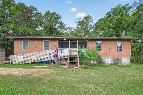Photo of 196 County Road 3707, Splendora, TX 77372 (MLS # 63877414)