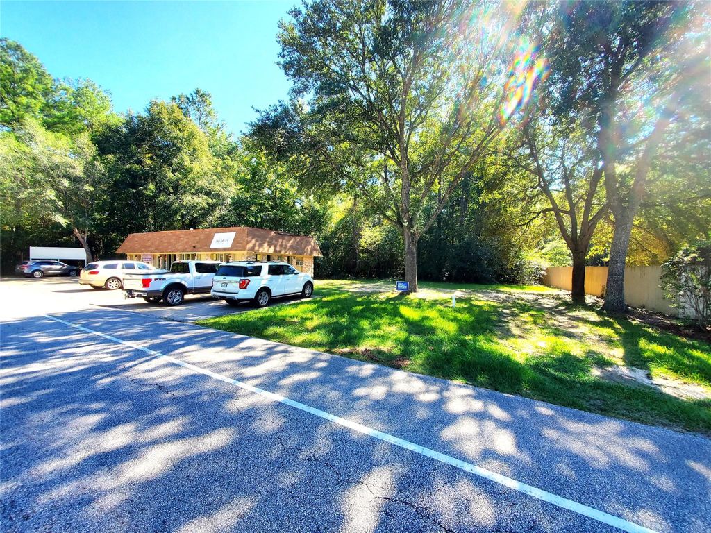 Photo of 1714 Roman Forest Boulevard, New Caney, TX 77357 (MLS # 82309985)