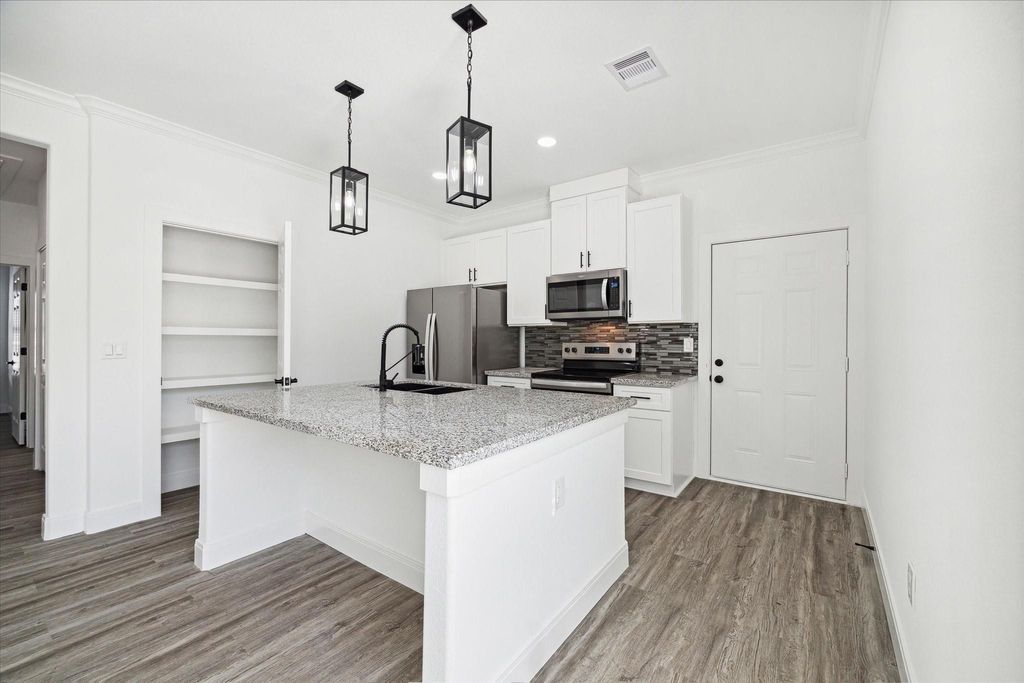 Photo of 120 W Mulberry Avenue, Wharton, TX 77488 (MLS # 38037318)