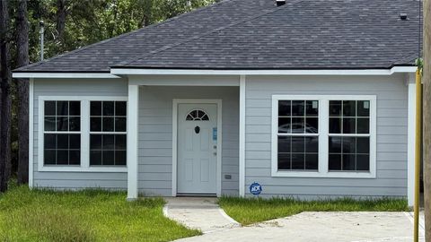 Photo of 10428 Royal Adrian Drive, Conroe, TX 77303 (MLS # 61528358)