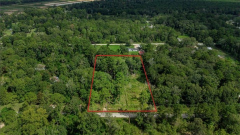 Photo of 1011 County Road 3709, Splendora, TX 77372 (MLS # 41206843)