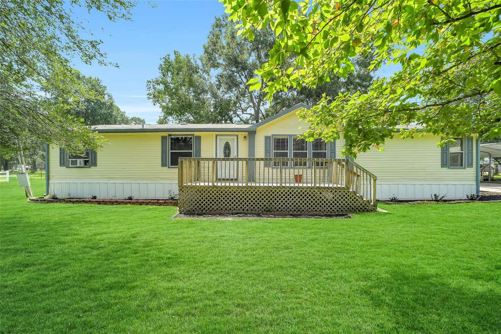 Photo of 8426 Hoda Drive, Conroe, TX 77303 (MLS # 98836764)
