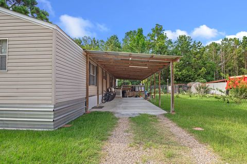 Photo of 519 Road 7000, Cleveland, TX 77327 (MLS # 81042350) Photo of 519 Road 7000, Cleveland, TX 77327 (MLS # 81042350)