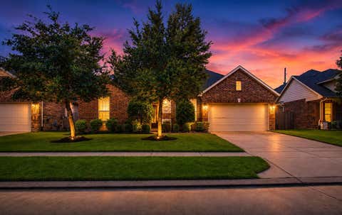 Photo of 22943 Banff Brook Way, Tomball, TX 77375 (MLS # 96827687)