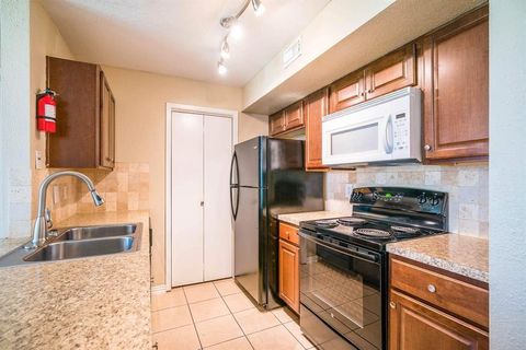 Photo of 3900 Woodchase Drive #63, Houston, TX 77042 (MLS # 30391825)