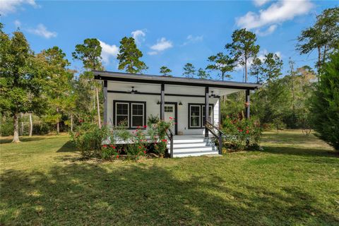 Photo of 1080 Hill Road, Willis, TX 77378 (MLS # 64467862)