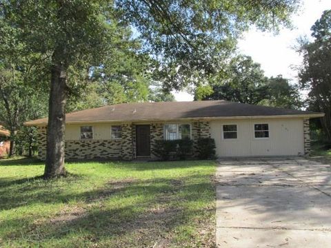 Photo of 2105 Bush Drive, Huntsville, TX 77320 (MLS # 61476821)