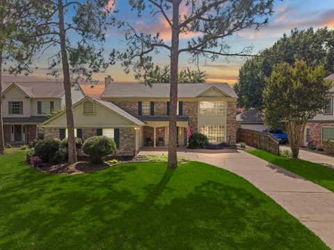 Photo of 7515 Honey Creek Lane, Houston, TX 77095 (MLS # 97492563)
