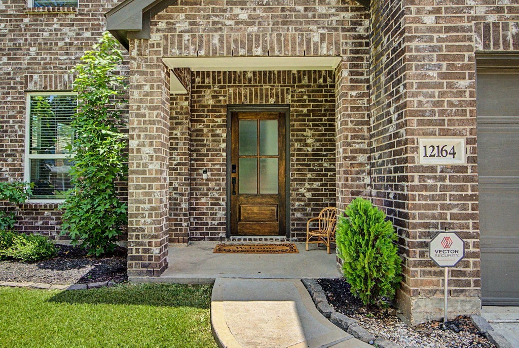 Photo of 12164 Maverick Drive, Willis, TX 77378 (MLS # 64367900)