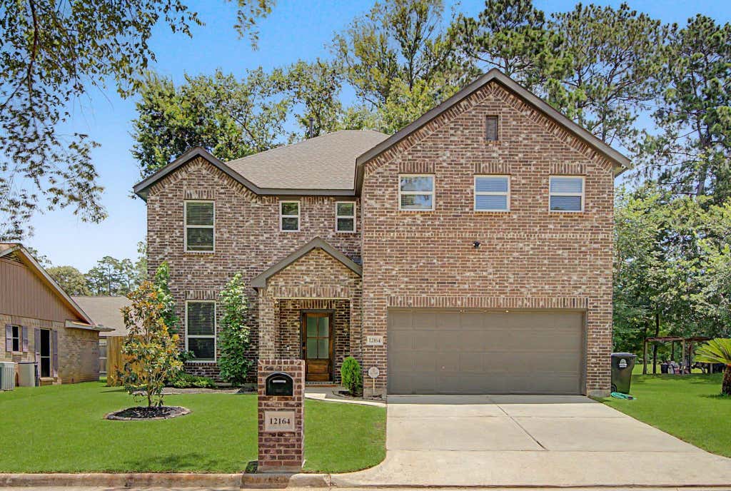 Photo of 12164 Maverick Drive, Willis, TX 77378 (MLS # 64367900)