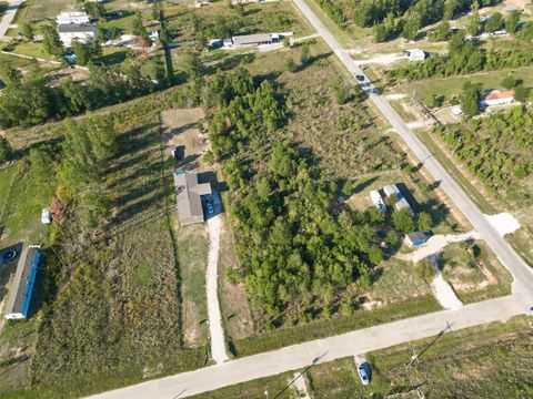 Photo of 1180 County Road 5023, Cleveland, TX 77327 (MLS # 43587387)