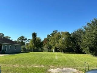 Photo of 1421 W Procter Street, Port Arthur, TX 77640 (MLS # 32821005)