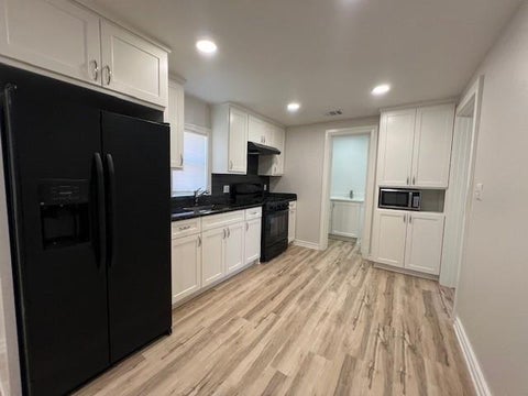 Photo of 407 Walton Street, Houston, TX 77009 (MLS # 28970862)
