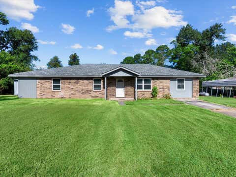 Photo of 53 Parker Creek Road, Huntsville, TX 77320 (MLS # 31882491)