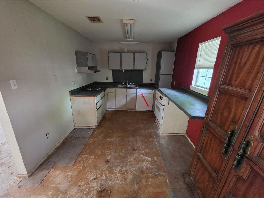 Photo of 12222 Oak Hollow Lane, Pinehurst, TX 77362 (MLS # 82151007)