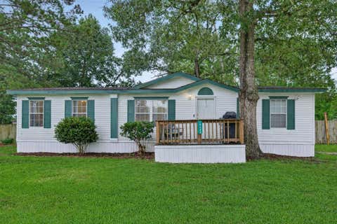 Photo of 16480 Brittany Way, Conroe, TX 77306 (MLS # 91400778)