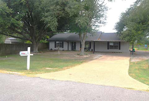 Photo of 1319 N Tammye Lane W, Madisonville, TX 77864 (MLS # 38784821)