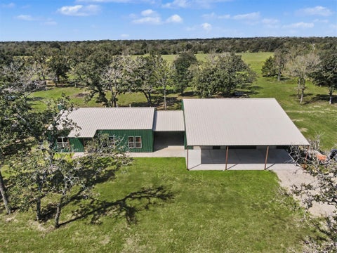 Photo of 2322 County Road 126, Bedias, TX 77831 (MLS # 98471126)