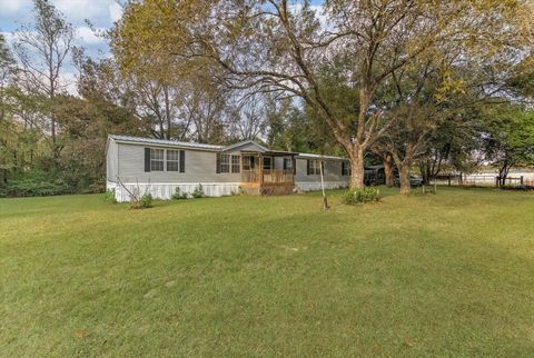Photo of 102 County Road 2194 Road W, Cleveland, TX 77327 (MLS # 79282399)