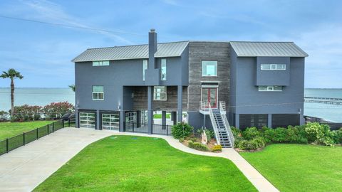 Photo of 12000 Sportsman Road, Galveston, TX 77554 (MLS # 87712668)